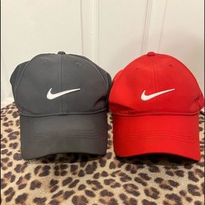 Two Nike Dri-fit hats. In great condition.